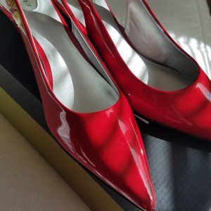 Red kitten heels by Trotters.